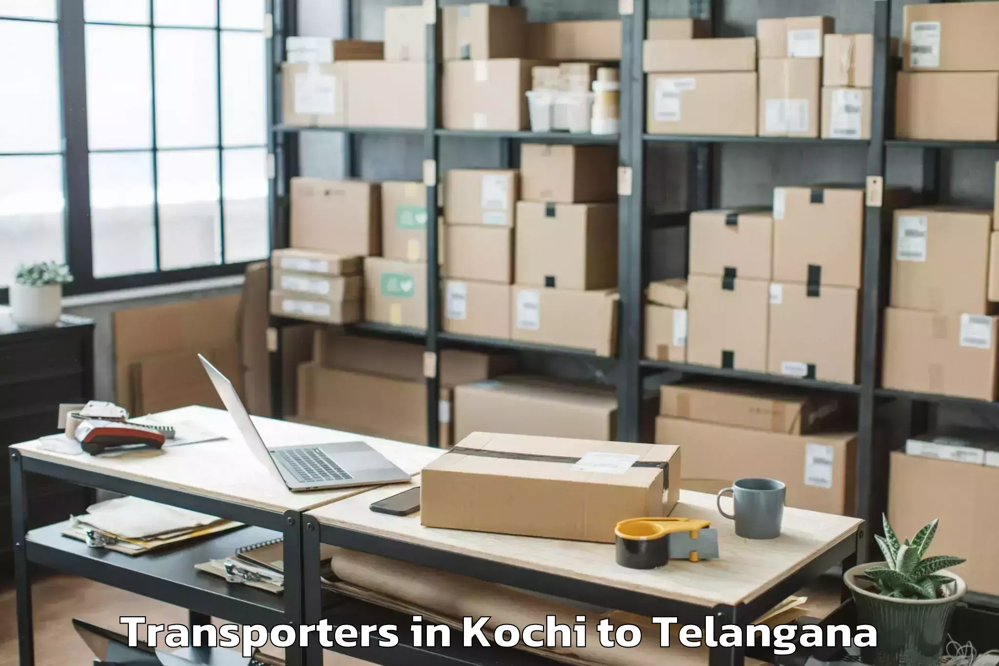 Get Kochi to University Of Hyderabad Transporters